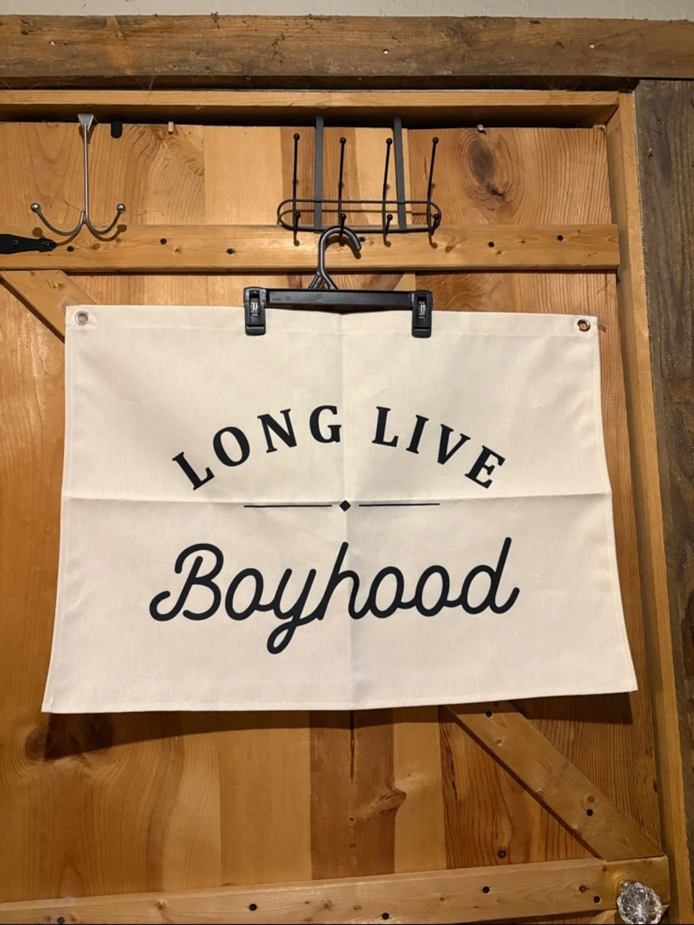 Cream Canvas Banner with Black 'Long Live Boyhood' Script